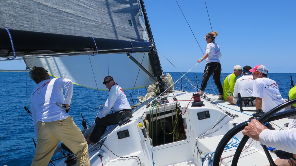 Yacht crew with a skipper - "in action"